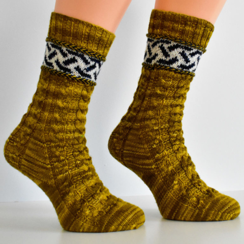 Braidalot cabled socks with latvian braids and stranded colourwork