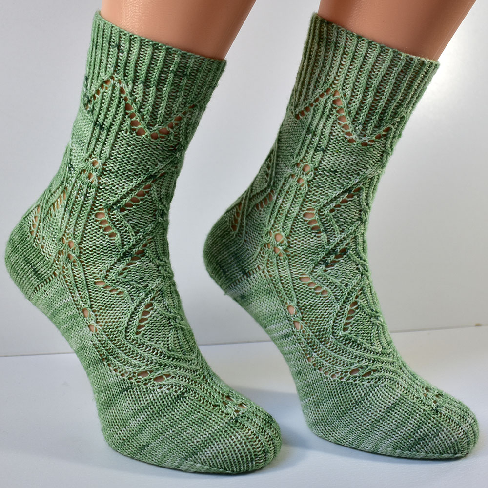 Triforium sock pattern with cables and lace